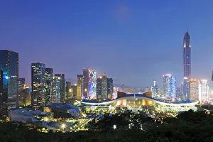 Shenzhen cityscape at dusk with the Civic Center and the Ping An IFC on foreground, China Shenzhen cityscape at dusk with the Civic Center and the Ping An IFC on foreground, China