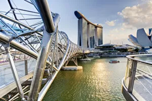 Images Dated 11th June 2012: Singapore, the Helix bridge leading across Marina Bay to the Marina Bay Sands hotel