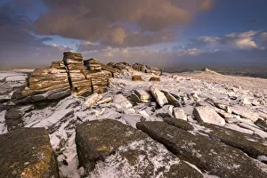 Snow dusted granite outcrops on Belstone Tor, Dartmoor, Devon, England Snow dusted granite outcrops on Belstone Tor, Dartmoor, Devon, England