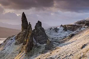 Images Dated 4th December 2013: Snow dusted Old Man of Storr at sunrise, Isle of Skye, Scotland. Winter (December) 2013