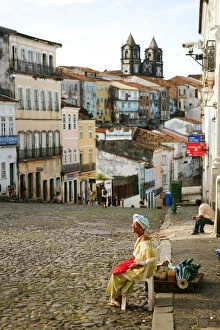 Images Dated 6th September 2012: South America, Brazil, Bahia, a Baiana woman looking out over the Pelourinho in the