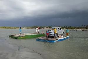 South America, Brazil, Ceara, Camocim, storm clouds over the ferry rafts at Guriu South America, Brazil, Ceara, Camocim, storm clouds over the ferry rafts at Guriu