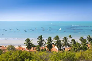 South America, Brazil, Ceara, Ponta Grossa, view of jangadas moored on an aquamarine South America, Brazil, Ceara, Ponta Grossa, view of jangadas moored on an aquamarine