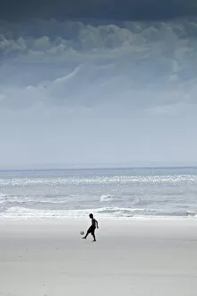 Images Dated 10th September 2012: South America, Brazil, Maranhao, Sao Luis, Sao Marcos beach, boy playing football