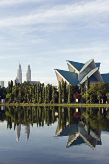 South East Asia, Malaysia, Kuala Lumpur, Petronas Towers and Istana Budaya National Theatre South East Asia, Malaysia, Kuala Lumpur, Petronas Towers and Istana Budaya National Theatre