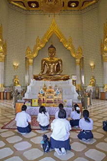 South East Asia, Thailand, Bangkok, Samphanthawong district, Chinatown, children praying South East Asia, Thailand, Bangkok, Samphanthawong district, Chinatown, children praying