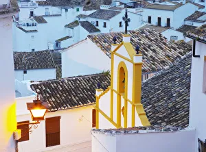 Spain, Andalucia, Setenil, view over church at dusk Spain, Andalucia, Setenil, view over church at dusk