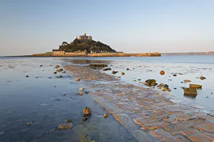 St Michaels Mount and the Causeway in early morning sunlight, Marazion, Cornwall, England St Michaels Mount and the Causeway in early morning sunlight, Marazion, Cornwall, England