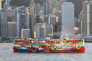 Star Ferry in Victoria Harbour with skyscrapers of Central, Hong Kong Star Ferry in Victoria Harbour with skyscrapers of Central, Hong Kong