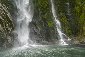 Stirling Falls reaching the sea in Milford Sound. Fiordland NP, Southland district Stirling Falls reaching the sea in Milford Sound. Fiordland NP, Southland district