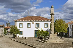The stone pilori, symbol of municipal authority, that stands in the main square of Algoso The stone pilori, symbol of municipal authority, that stands in the main square of Algoso