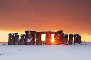 Stonehenge at Sunset in Winter, Salisbury Plain, Wiltshire, England Stonehenge at Sunset in Winter, Salisbury Plain, Wiltshire, England