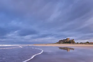 Stormy sky above Bamburgh Castle in Northumberland, England. Spring Stormy sky above Bamburgh Castle in Northumberland, England. Spring