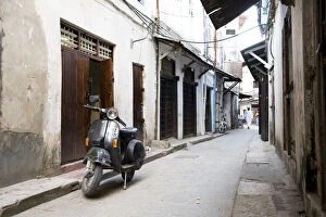 Stone Town of Zanzibar Gallery: Street scene in Stone Town with moped, Unguja Island, Zanzibar archipelago, Tanzania