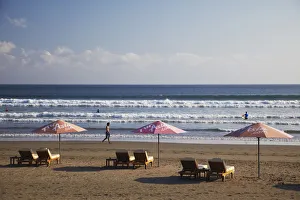 Sun loungers on Legian beach, Bali, Indonesia Sun loungers on Legian beach, Bali, Indonesia
