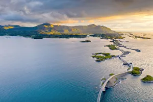 Sunset over the Atlantic Road connecting mainland and islands, aerial view Sunset over the Atlantic Road connecting mainland and islands, aerial view