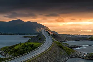 Sunset over the curves of Storseisundet Bridge along the Atlantic Road Sunset over the curves of Storseisundet Bridge along the Atlantic Road