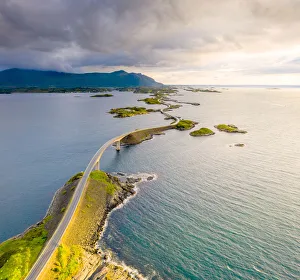 Sunset over Storseisundet Bridge view from above, Atlantic Road, More og Romsdal county Sunset over Storseisundet Bridge view from above, Atlantic Road, More og Romsdal county