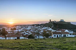 Sunset at the white washed village of Arraiolos with the 13th century medieval castle Sunset at the white washed village of Arraiolos with the 13th century medieval castle