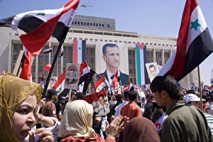 Supporters at a rally in downtown Damascus endorsing Supporters at a rally in downtown Damascus endorsing