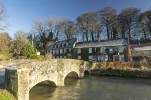 The Swan pub and bridge, Bibury, Cotswolds, Gloucestershire, England, UK The Swan pub and bridge, Bibury, Cotswolds, Gloucestershire, England, UK