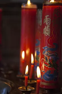 Taiwan Collection: Taiwan, Taipei, Candles burning at Bao-an Temple