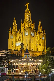 Tibidabo amusement park by night with Temple de Sagrat Cor behind, Barcelona, Catalonia Tibidabo amusement park by night with Temple de Sagrat Cor behind, Barcelona, Catalonia