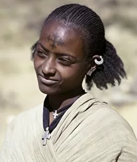 Related Images Collection: A Tigray woman has a cross of the Ethiopian Orthodox