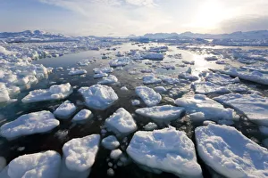 Tiniteqilaq and sea ice in fjord, E. Greenland Tiniteqilaq and sea ice in fjord, E. Greenland
