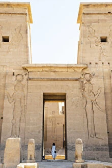 Lake Nasser Gallery: Tourist walking throuhg the Temple of Philae on an island in Lake Nasser, Nile River