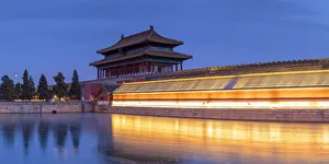 Towers and moat of Forbidden City at dusk, Beijing, China Towers and moat of Forbidden City at dusk, Beijing, China