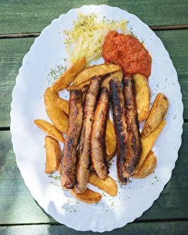Prints of Traditional Bosnian dish of sausages, Old Town, Sarajevo, Bosnia and Hercegovina Bosnia And Herzegovina Prints: Print of Traditional Bosnian Sausages in Old Town, Sarajevo