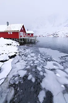 Traditional fishermans huts (Rorbu) on the icy sea, Reine Bay, Lofoten Islands Traditional fishermans huts (Rorbu) on the icy sea, Reine Bay, Lofoten Islands