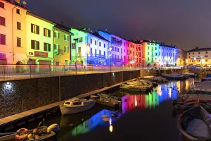 Traditional houses of Domaso colored by Christmas lights, Lake Como, province of Como Traditional houses of Domaso colored by Christmas lights, Lake Como, province of Como