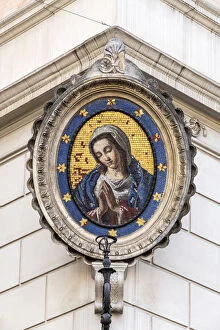 Traditional Madonnella or Madonna mosaic placed in a buildingaAAs corner, Rome, Lazio