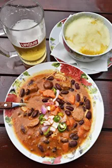 Traditional pork goulash prepared with hot sausages and red beans and traditional Traditional pork goulash prepared with hot sausages and red beans and traditional