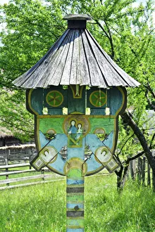 Traditional wooden crossroad cross of Romania Traditional wooden crossroad cross of Romania