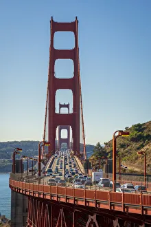 Traffic on famous Golden Gate Bridge against clear sky, San Francisco Traffic on famous Golden Gate Bridge against clear sky, San Francisco