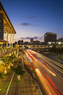 Traffic passing Asahibashi monorail station in downtown Naha, Okinawa, Japan Traffic passing Asahibashi monorail station in downtown Naha, Okinawa, Japan