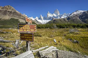Trail direction signs against iconic Fitz Roy mountain, Sendero al Fitz Roy, UNESCO Trail direction signs against iconic Fitz Roy mountain, Sendero al Fitz Roy, UNESCO