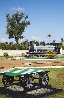 Train engine on display outside railway station, Inhambane, Mozambique Train engine on display outside railway station, Inhambane, Mozambique