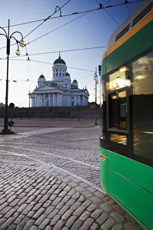 Tram passing in front of Lutheran Cathedral in Senate Square, Helsinki, Finland Tram passing in front of Lutheran Cathedral in Senate Square, Helsinki, Finland