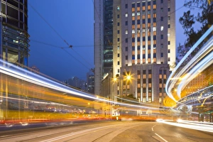 Trams passing Bank of China Building and HSBC Building, Central, Hong Kong, China Trams passing Bank of China Building and HSBC Building, Central, Hong Kong, China