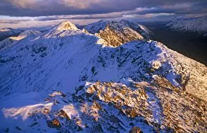 Images Dated 13th January 2011: Traversing the Aonach Eagach Ridge above Glencoe, Scottish Highlands