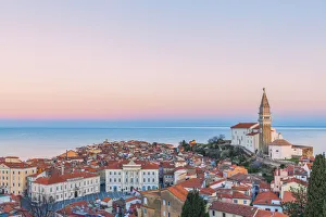 Twilight on the historic town of Piran with the church of St Twilight on the historic town of Piran with the church of St