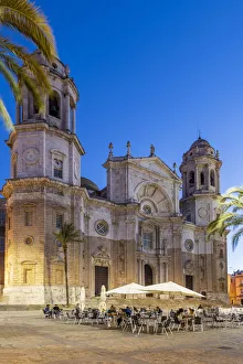 Twilight view of an outdoor cafe in Plaza de la Catedral, Cadiz, Andalusia, Spain Twilight view of an outdoor cafe in Plaza de la Catedral, Cadiz, Andalusia, Spain