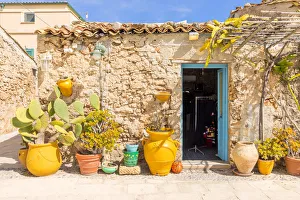 Typical rustic restaurant in Regina Margherita square of Marzamemi, Siracusa province Typical rustic restaurant in Regina Margherita square of Marzamemi, Siracusa province