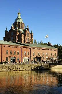 Uspenski Orthodox Cathedral near the bars and restaurants in Kanavaranta quay. Helsinki Uspenski Orthodox Cathedral near the bars and restaurants in Kanavaranta quay. Helsinki