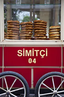 Vendor selling bread rools on red Trolley with Beyoglu area, Istanbul, Turkey Vendor selling bread rools on red Trolley with Beyoglu area, Istanbul, Turkey
