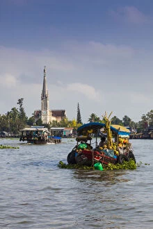 Images Dated 23rd October 2015: Vietnam, Mekong Delta, Cai Be, Cai Be Floating Market, with view of the Catholic Cathedral